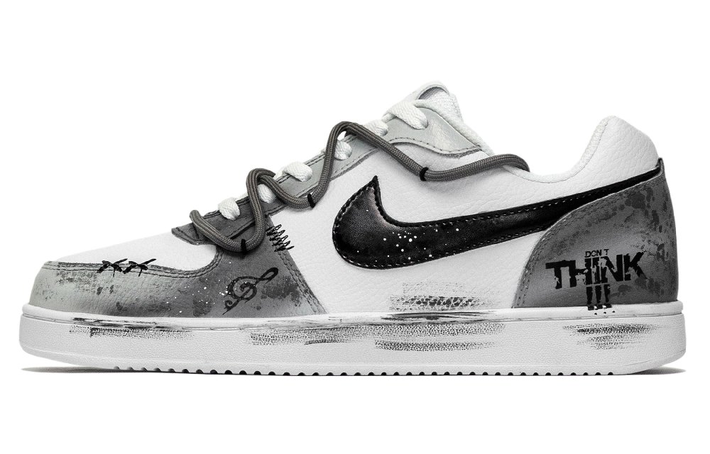 Nike EBERNON 668, Rusty Musical Note Abrasion Resistant Low Top Skateboard Shoes Unisex Black White